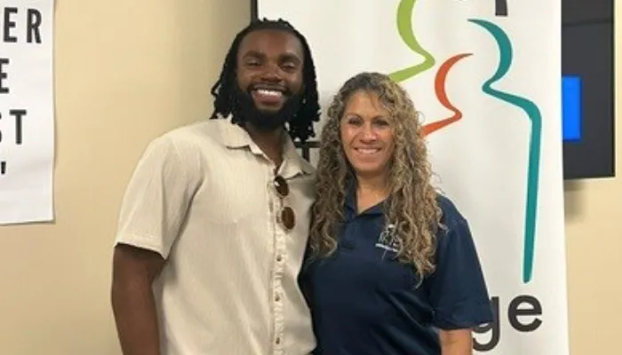 Take Stock in College and Career scholar Jaiwan Hutchinson with Associate Director Gigi Graves