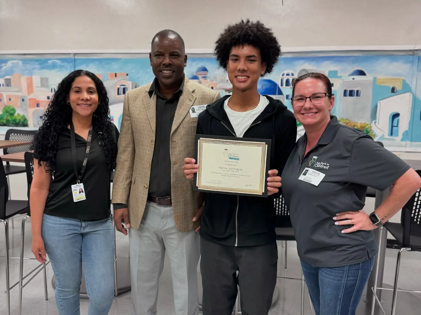 Take Stock Leaders 4 Life fellow Keiya Johnson with father and TSIC Broward staff
